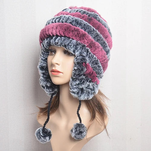 Cappello invernale da donna con copri orecchie. Eleganza in morbida pelliccia sintetica.