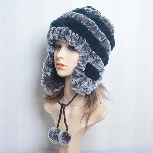 Cappello invernale da donna con copri orecchie. Eleganza in morbida pelliccia sintetica.