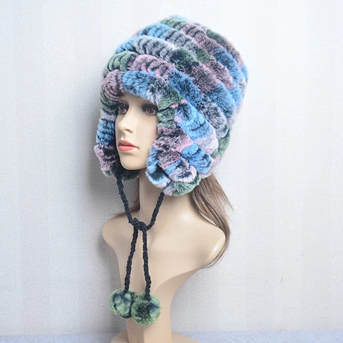 Cappello invernale da donna con copri orecchie. Eleganza in morbida pelliccia sintetica.