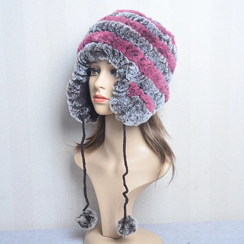 Cappello invernale da donna con copri orecchie. Eleganza in morbida pelliccia sintetica.