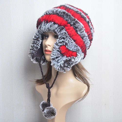 Cappello invernale da donna con copri orecchie. Eleganza in morbida pelliccia sintetica.