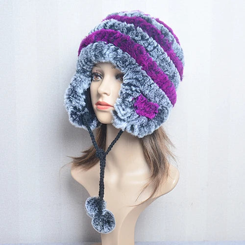 Cappello invernale da donna con copri orecchie. Eleganza in morbida pelliccia sintetica.