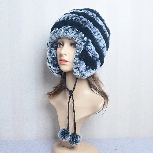 Cappello invernale da donna con copri orecchie. Eleganza in morbida pelliccia sintetica.