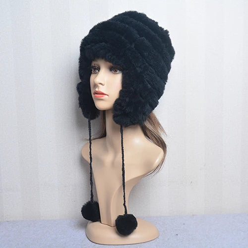 Cappello invernale da donna con copri orecchie. Eleganza in morbida pelliccia sintetica.