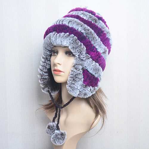 Cappello invernale da donna con copri orecchie. Eleganza in morbida pelliccia sintetica.