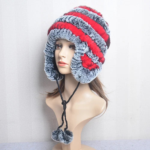 Cappello invernale da donna con copri orecchie. Eleganza in morbida pelliccia sintetica.