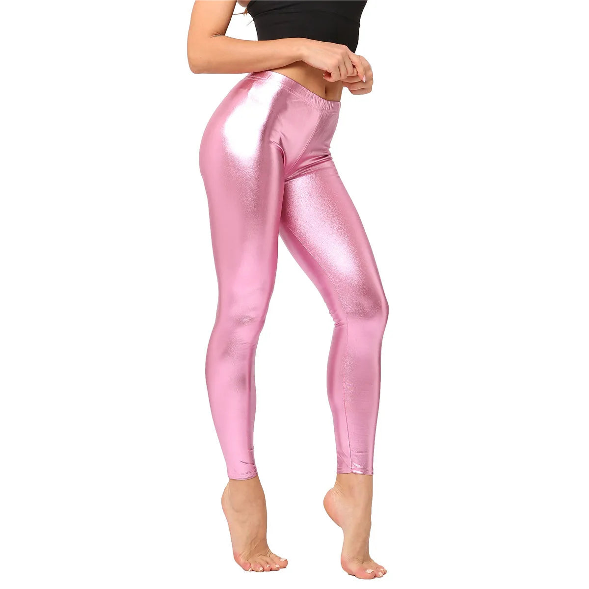Pantaloni leggins elasticizzati, casual a vita alta da donna. Colore lucido disponibile in più tonalità e design.