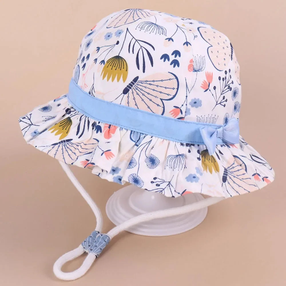 Cappello primavera/estate per bambino/a con immagini colorate. Protezione a 360° in cotone traspirante.