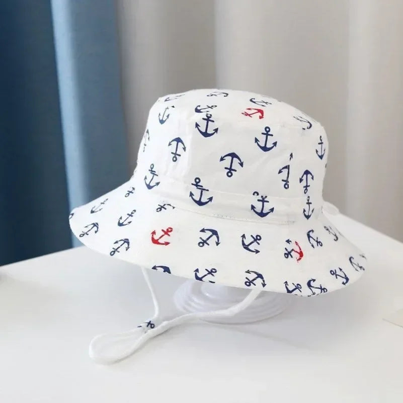 Cappello primavera/estate per bambino/a con immagini colorate. Protezione a 360° in cotone traspirante.