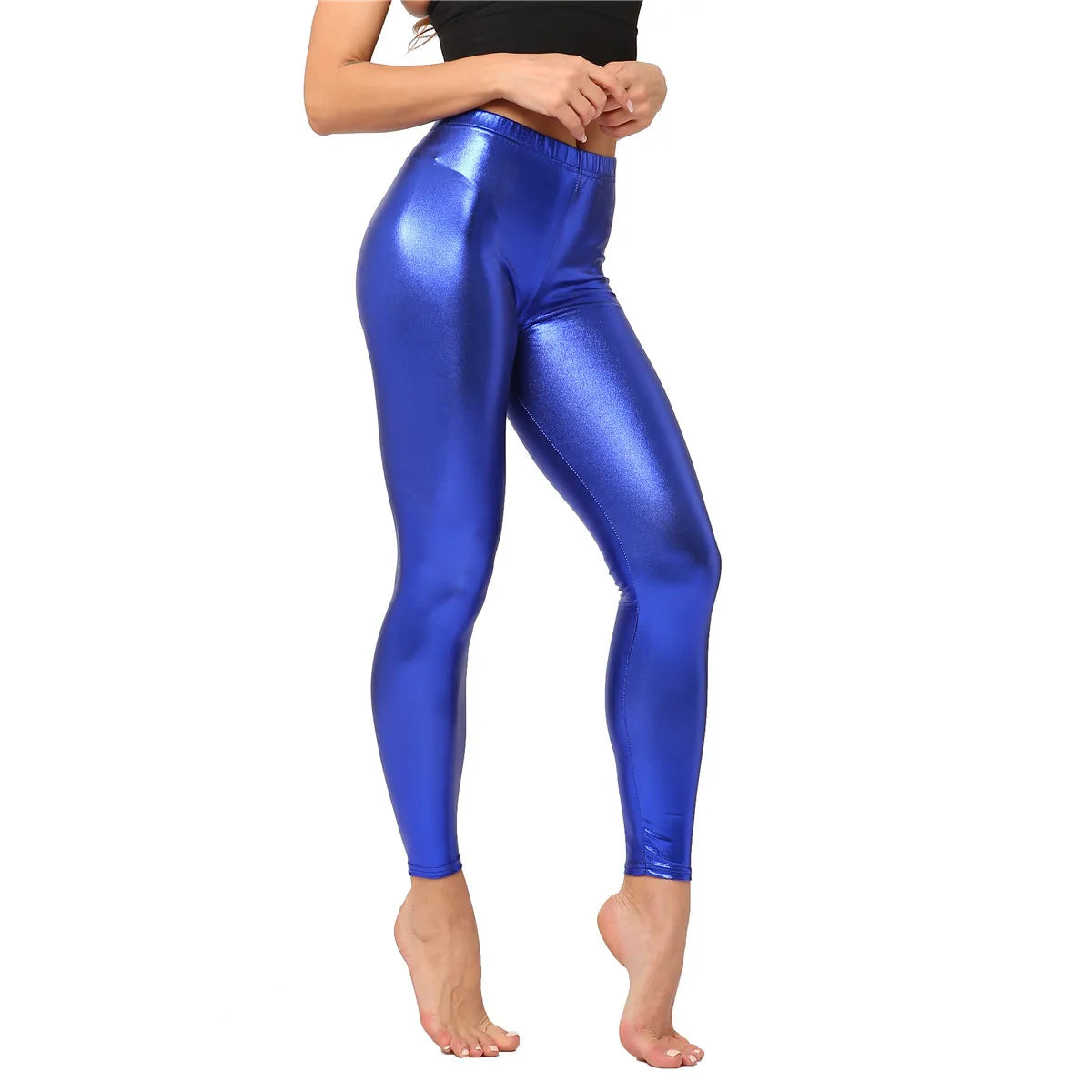 Pantaloni leggins elasticizzati, casual a vita alta da donna. Colore lucido disponibile in più tonalità e design.