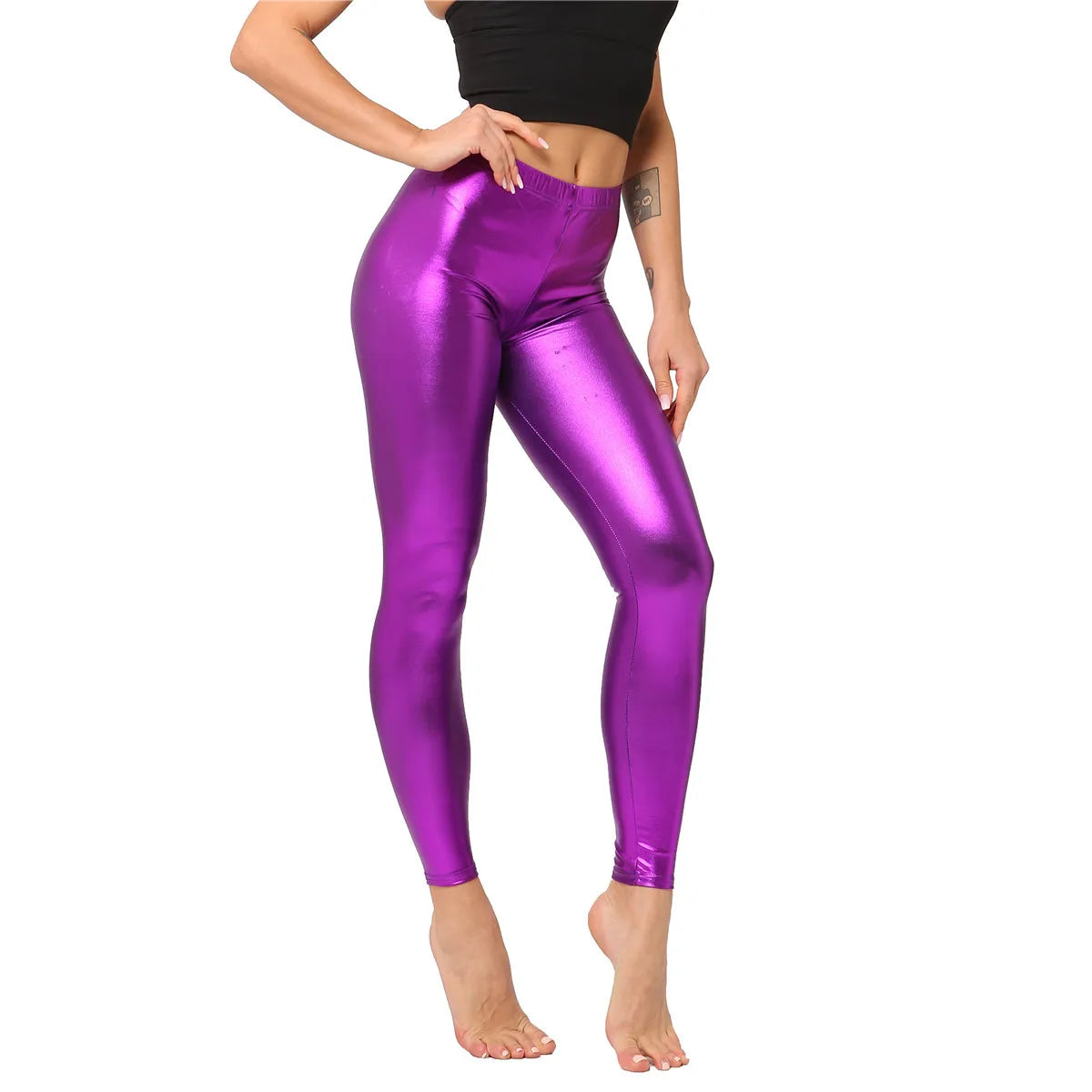 Pantaloni leggins elasticizzati, casual a vita alta da donna. Colore lucido disponibile in più tonalità e design.