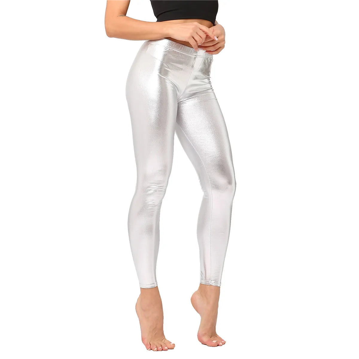 Pantaloni leggins elasticizzati, casual a vita alta da donna. Colore lucido disponibile in più tonalità e design.