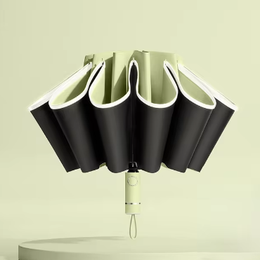 Ombrello pieghevole inverso, completamente automatico con striscia riflettente.