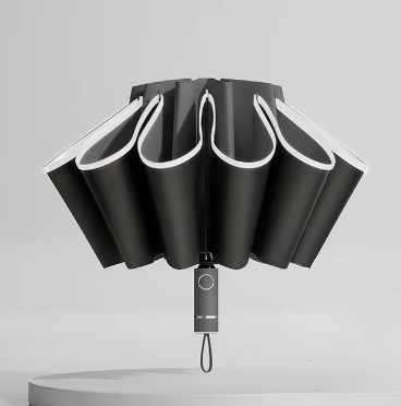 Ombrello pieghevole inverso, completamente automatico con striscia riflettente.