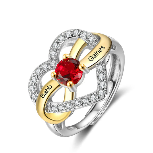 Anello personalizzabile a forma di cuore con scritta incisa.  Con pietra colorata.