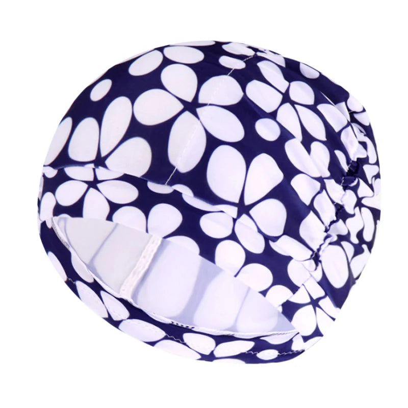 Cuffia da nuoto per donna adulta e bambina.  In nylon elastico con design per capelli lunghi.