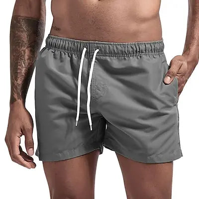 Costume Da Bagno Da Uomo Stile a Pantaloncino con Tasche. Colori Vivaci. e Design Moderno, Traspirante e Robusto.