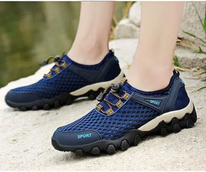 Scarpa sportiva primavera/estate da uomo, traspirante, morbida e resistente. Misura dal 39 al 44, disponibile grigia, blu e nera.