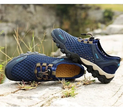 Scarpa sportiva primavera/estate da uomo, traspirante, morbida e resistente. Misura dal 39 al 44, disponibile grigia, blu e nera.