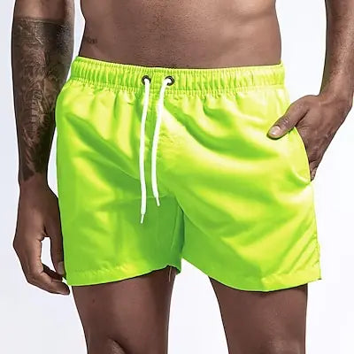 Costume Da Bagno Da Uomo Stile a Pantaloncino con Tasche. Colori Vivaci. e Design Moderno, Traspirante e Robusto.