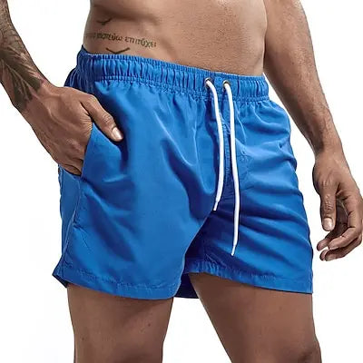 Costume Da Bagno Da Uomo Stile a Pantaloncino con Tasche. Colori Vivaci. e Design Moderno, Traspirante e Robusto.