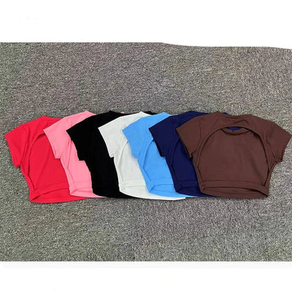 Top/T-shirt sportiva/casual, manica corta, per donna. Sette colori e 3 misure per la scelta.