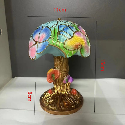 Lampada da tavolo creativa della serie di piante colorate in resina. Lampada colorata crea atmosfera a forma di fiore, fungo.