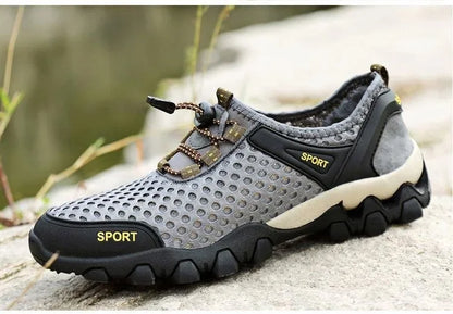 Scarpa sportiva primavera/estate da uomo, traspirante, morbida e resistente. Misura dal 39 al 44, disponibile grigia, blu e nera.