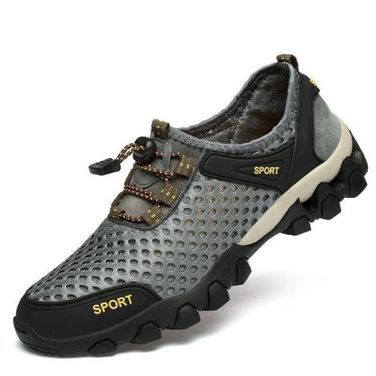 Scarpa sportiva primavera/estate da uomo, traspirante, morbida e resistente. Misura dal 39 al 44, disponibile grigia, blu e nera.