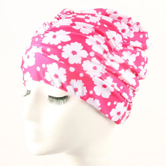 Cuffia da nuoto per donna adulta e bambina.  In nylon elastico con design per capelli lunghi.