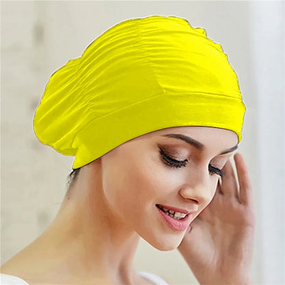 Cuffia da nuoto per donna adulta e bambina.  In nylon elastico con design per capelli lunghi.