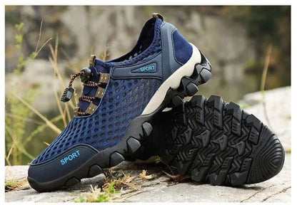 Scarpa sportiva primavera/estate da uomo, traspirante, morbida e resistente. Misura dal 39 al 44, disponibile grigia, blu e nera.