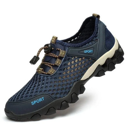Scarpa sportiva primavera/estate da uomo, traspirante, morbida e resistente. Misura dal 39 al 44, disponibile grigia, blu e nera.